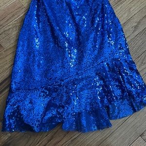 Brand new never worn homecoming dress. Royal blue with sparkles. Has tie back.